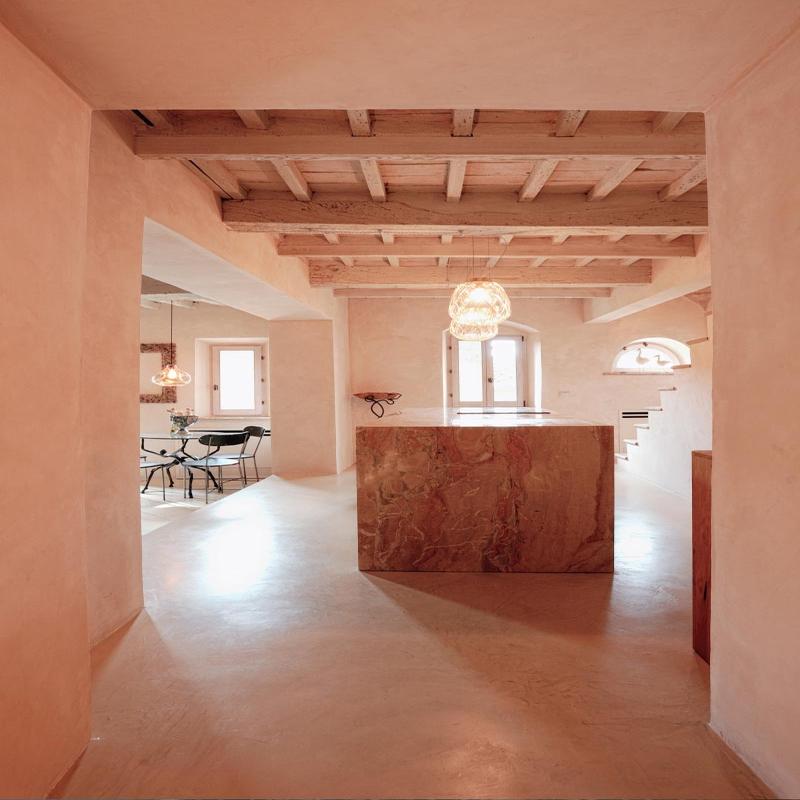 Spacious interior of a restored house in Tuscany by Archidomus - Monica Rossi Architetto